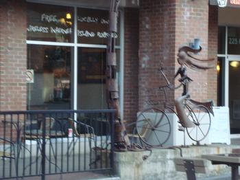 Sculpture - Drink coffee, texting, riding bike